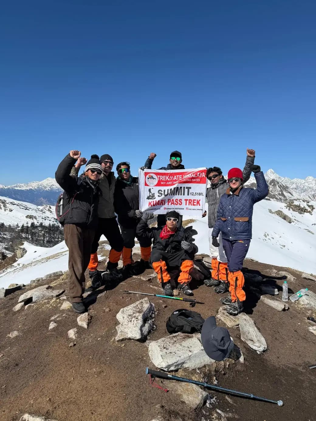Group summit celebration in Himalayas